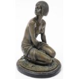 After Amadeo Gennarelli (French/Italian, 1881-1943). Bronzed figure of a semi clad lady, modelled in