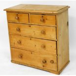 A Victorian pine chest, of two short over three long graduated drawers, raised on a plinth base, 89c