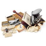 An Adanar printing machine, with instruction manual and various attachments.