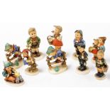 A group of Goebel Hummel figures, to include Village Boy, Home From Market, Boy on a Bench, etc. (10