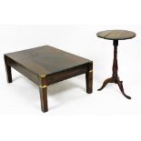 A rectangular oak and brass bound coffee table, raised on square legs, 40cm high, 101cm wide, 67.5cm