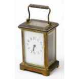 A 19thC brass cased carriage clock, enamel dial bearing Roman numerals, single barrel movement, in t