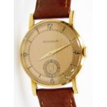 A Jaeger-Lecoultre gentleman's 9ct gold wristwatch, circular rose coloured dial bearing Arabic numer