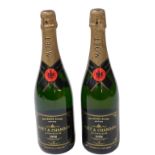Two bottles of Moet & Chandon Millesime Blanc vintage Champagne, 1998.