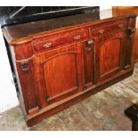 A Victorian mahogany sideboard, with two frieze drawers above two panelled doors, on a plinth, 90cm