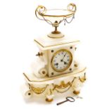 A late 19thC French gilt mounted alabaster mantel clock, the circular dial signed Ferlet Brenon with