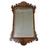 A 19thC mahogany fret frame wall mirror, with fret carved scroll and top with rectangular mirrored p