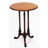 A 19thC mahogany circular occasional table, raised on slender turned columns, above a triform base a