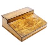 A Victorian olive wood and inlaid writing slope, the hinged top opening to reveal a fitted interior,
