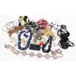 Costume jewellery, including necklaces, belts and clip earrings. (a quantity)