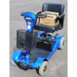 A Sterling Sapphire electric blue mobility scooter, with battery and key.