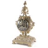 A 19thC silvered bronze mantel clock, in highly elaborate case surrounded by a compressed finial wit