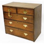 A George III style oak chest, of two short over three long graduated drawers, 88cm high, 95cm wide,