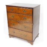 A George III oak chest, of four long graduated drawers, raised on bracket feet, 114cm high, 93cm wid