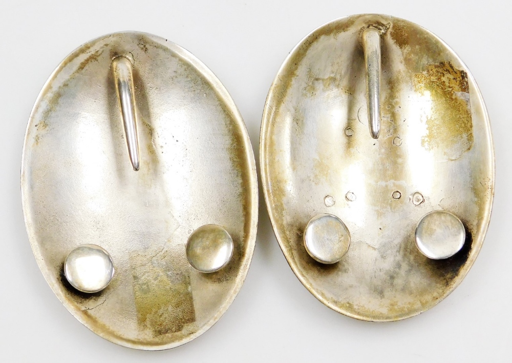 Two military white coloured metal buckles, of oval form, one engraved E.R 15, within a garter frame, - Image 2 of 2