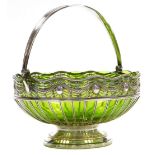 An early 20thC WMF silver plated basket, with an inset pale green glass bowl, pierced and embossed w