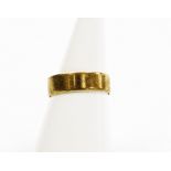 A 9ct gold wedding band, size M, 2.4g.