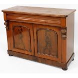 A Victorian mahogany sideboard, with a cushion drawer over a pair of panelled doors opening to revea