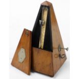 A metronome, Sabel for Maelzel, walnut case, 23cm high.