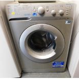 An Indesit Innex washing machine, XWSC61252.