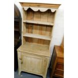 A pine narrow dresser, the top with moulded cornice above two shelves and two cabinets to base, 170c