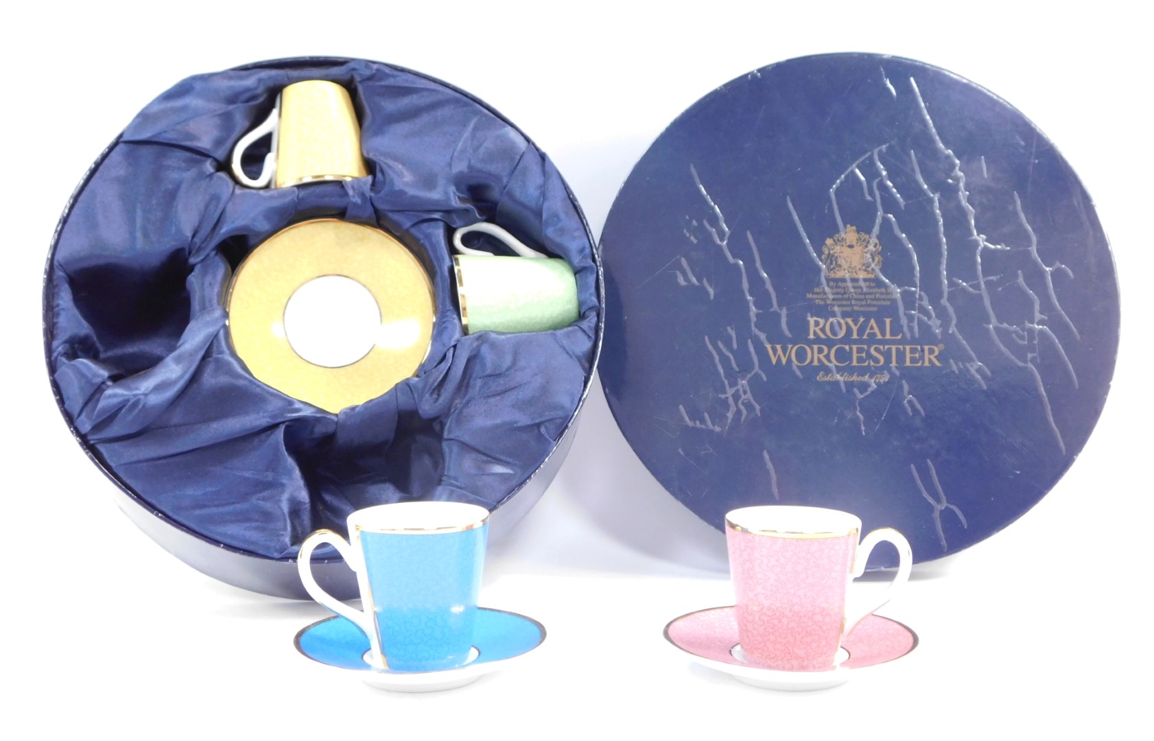 A Royal Worcester celebration cased coffee set, in celebration of HRH 80th Birthday, dated 2006,