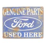 A Ford Genuine Parts tin sign, marked Genuine Parts Ford Used Here in blue and white, 31cm x 40cm.