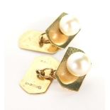 A pair of 9ct gold gents cuff links, each with rectangular shield, half engine turned detailing and