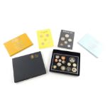 A Royal Mint coin set 2010 proof, to include Restoration of the Monarchy five pound in outer case, a