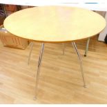 A modern circular cafe table, with chrome plated legs, 73cm high, 81cm diameter. With the option o