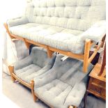 An Ercol Wychwood elm three piece suite, re-upholstered in grey fabric, the sofa 189cm wide. Purch