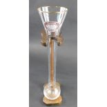 A Raffles Singapore Hotel advertising drinking vessel, on wooden stand, 42cm high.