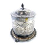 A late 19th/early 20thC silver plated biscuit barrel, with an acorn finial and an all over design of