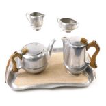 A Picquot ware five piece tea and coffee service, to include coffee pot, 22cm high, teapot, tray, et