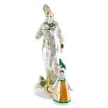 A Russian porcelain Dulevo figure group, green with gild highlights, 37cm high and another figure wi