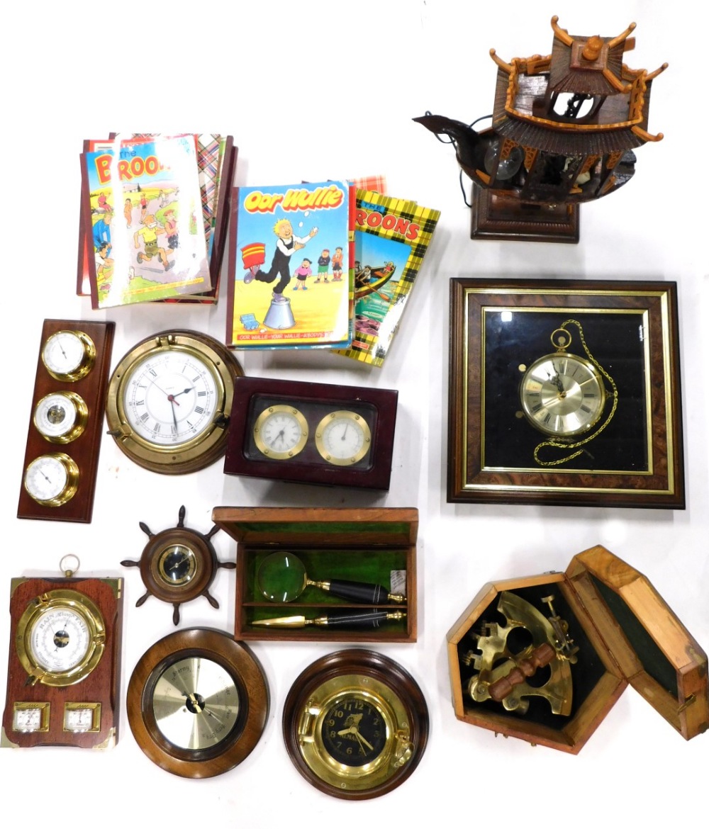 A ship's style clock, with brass front, 20cm diameter, two others, box with anchor emblem, reproduct