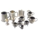 Various pewter, 19thC and other, tapering mug, 13cm high, salts, jug, hip flask, etc. (a quantity)