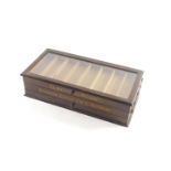 A 19thC Clark's Anchor oak haberdashery cotton box, of rectangular form, with hinged glazed lid and