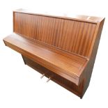 A mahogany upright piano by Moore & Moore, 131cm wide.