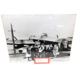 A photographic print of a Lancaster, R5740 (KN-0) and crew, mounted on board, 105cm x 138cm. The R5
