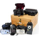 A group of cameras, to include a Minolta X-700 camera, a Minolta Auto 360PX flash, Sony Cybershot di