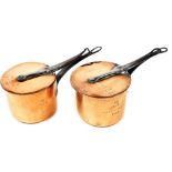 Two 19thC copper saucepans and lids, one engraved L.P with crown crest, Fontainebleau 1845, numbered