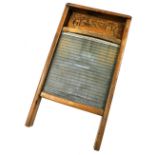 The Glassick pine and glass wash board, 59cm high, 32cm wide.