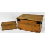 A 19thC pine and metal mount small toolbox, 56cm wide, and another pine box, 37cm wide.