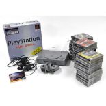 A Sony Playstation Dual Shock, boxed, together with assorted games, including Final Fantasy, Driver,