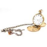 A Waltham USA gold plated hunter pocket watch, with white enamel dial and seconds dial with bezel wi