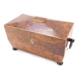 A Victorian burr walnut tea caddy, with a domed top, and mother of pearl keyhole, with swing handles