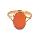 A signet ring, with oval faceted orange bloodstone, in a yellow metal setting stamped 9ct, size R, 2