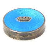 A George V Gieves Ltd silver and blue enamel compact, with a light blue enamel top and raised crown