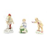 Three Royal Worcester Months of The Year figures, comprising May, November and December, 12cm high,